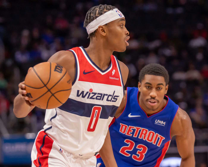 Washington Wizards guard Bilal Coulibaly (0) controls the ball in front of Detroit Pistons guard Jaden Ivey (23) during the second half at Little Caesars Arena.